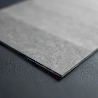Lateral flow sample filtration pad